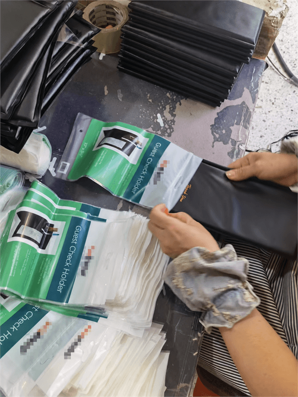 Packing custom hospitality presentation products in protective bags