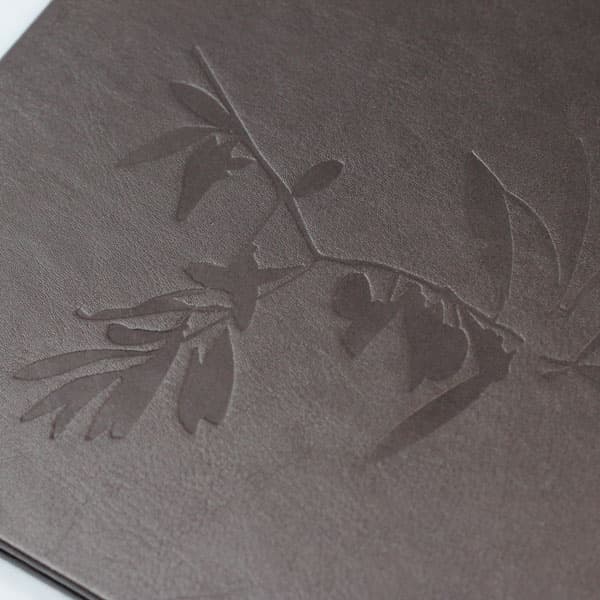 Debossing customization finish on hospitality products
