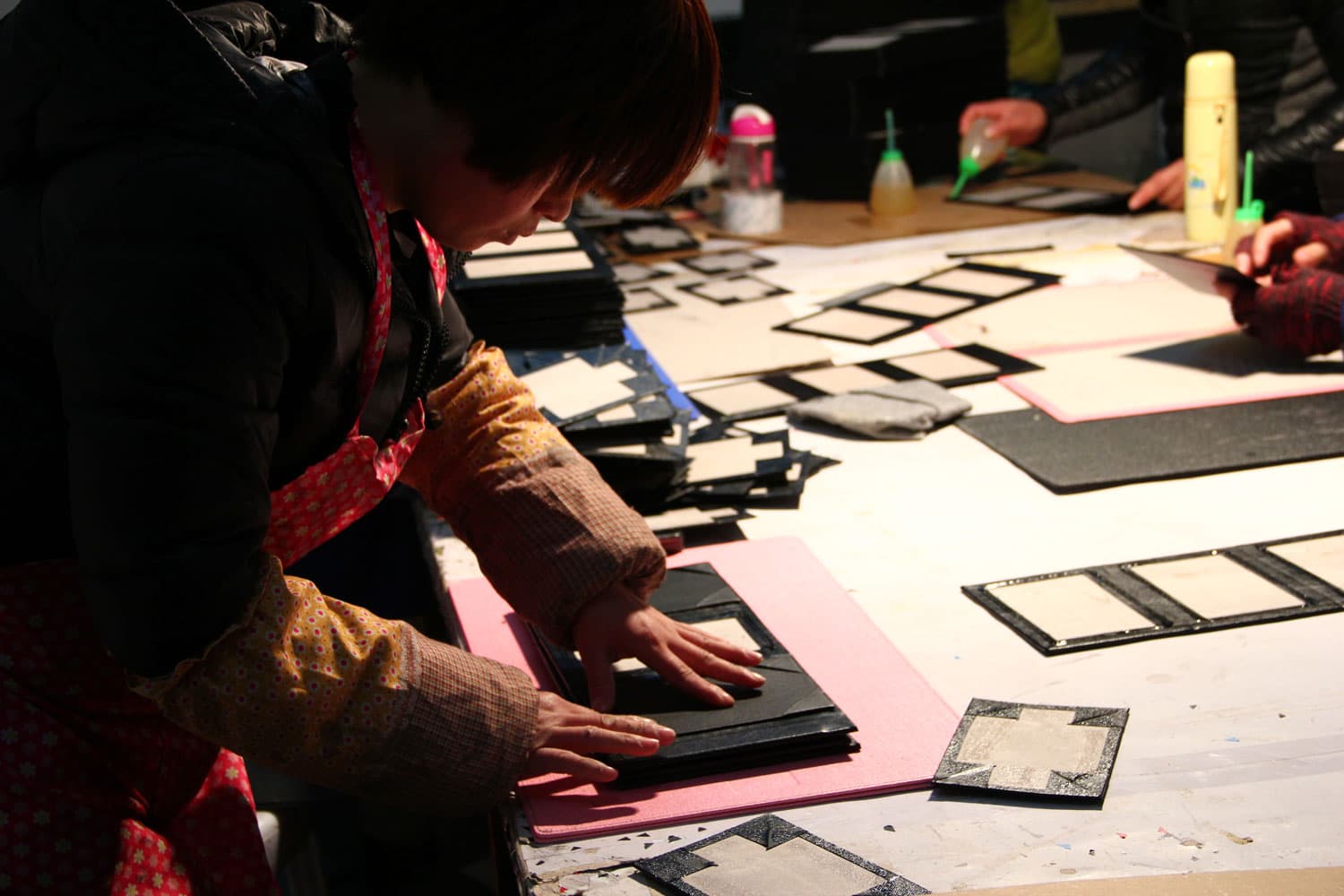 Menunique factory team assembling custom menu covers