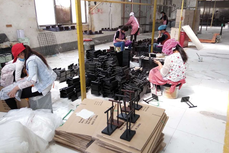 Bulk order inspection and packing at a hospitality product factory